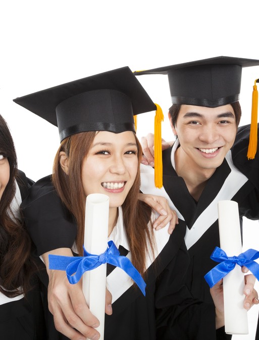 happy asian students graduating